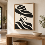 Black and Cream Woman in Wide-Brim Hat Canvas Wall Art