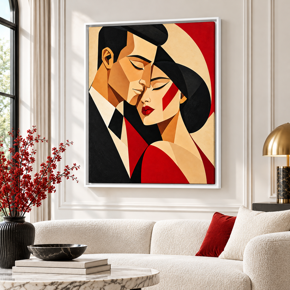 Red and black geometric couple canvas wall art in a white frame above a cream sofa
