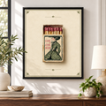 Vintage woman matchbox canvas wall art in a black frame above a wooden console
