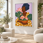 Woman with pink lotus flowers canvas wall art in a white frame in a neutral living room